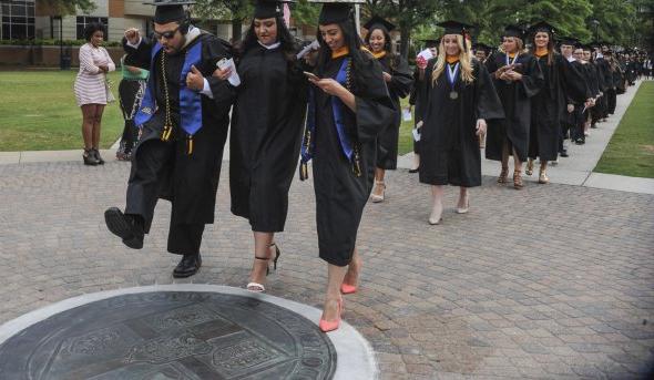 Walking on Seal During Commencement